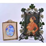 A FRENCH EMPIRE STYLE PHOTOGRAPH FRAME together with another. Largest 27 cm x 15 cm. (2)