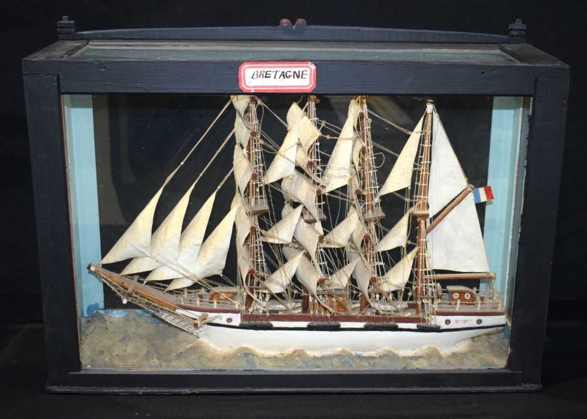 A glass cased model of a 19th Century 3 masted French sailing ship "Bretagne" 35 x 53 x 16 cm.