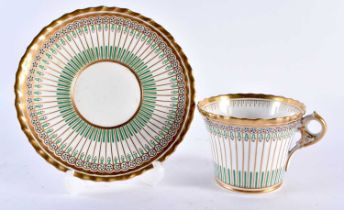 AN EARLY 19TH CENTURY CHAMBERLAINS WORCESTER PORCELAIN CUP AND SAUCER painted with blue and yellow