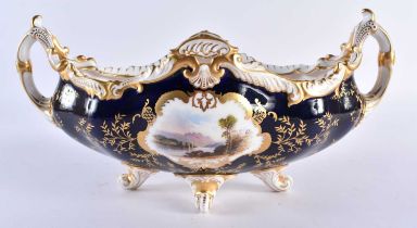 Late 19th early 20th century Coalport two handled boat shaped vase decorated with two gilt panels