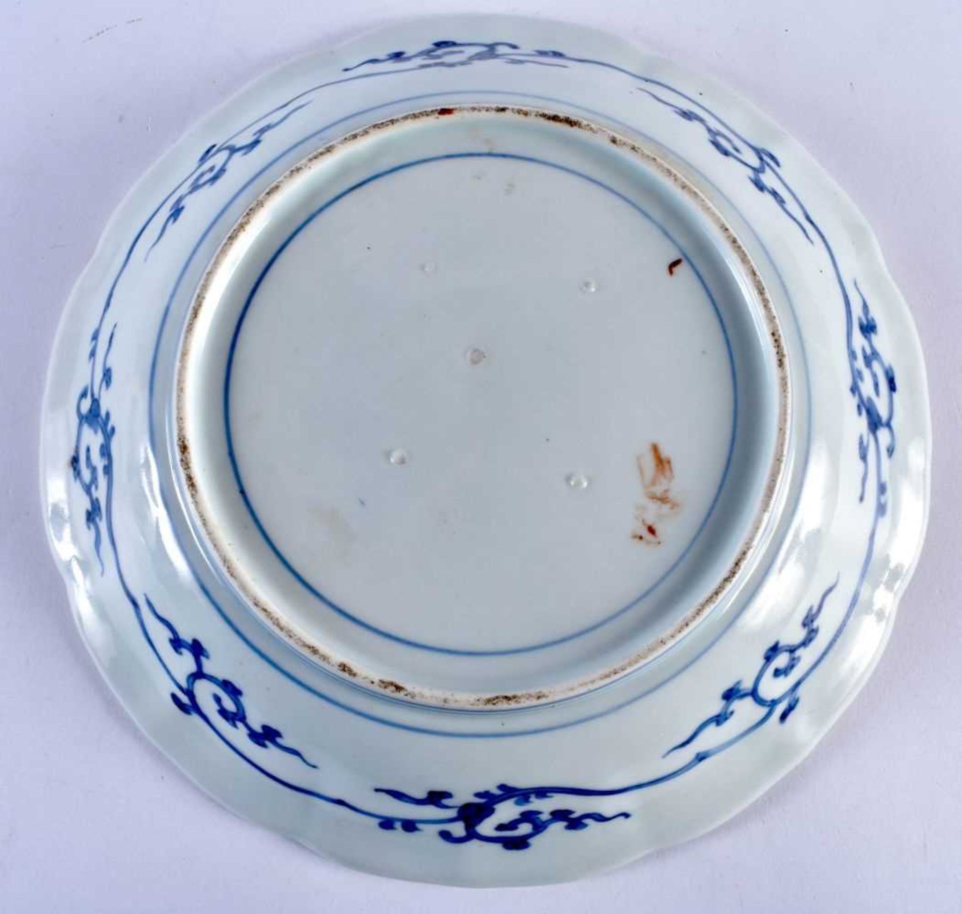 A LARGE 18TH CENTURY JAPANESE EDO PERIOD BLUE AND WHITE FLUTED DISH painted with an urn of - Image 3 of 3