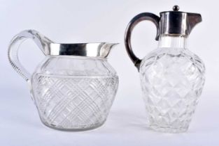 AN ANTIQUE SILVER PLATED CUT GLASS CLARET JUG together with another silver plated mounted cut
