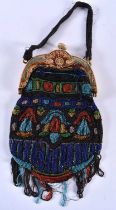 AN ART DECO BEADWORK PURSE the mounts decorated with a mythical dolphins. 38 cm x 15 cm.