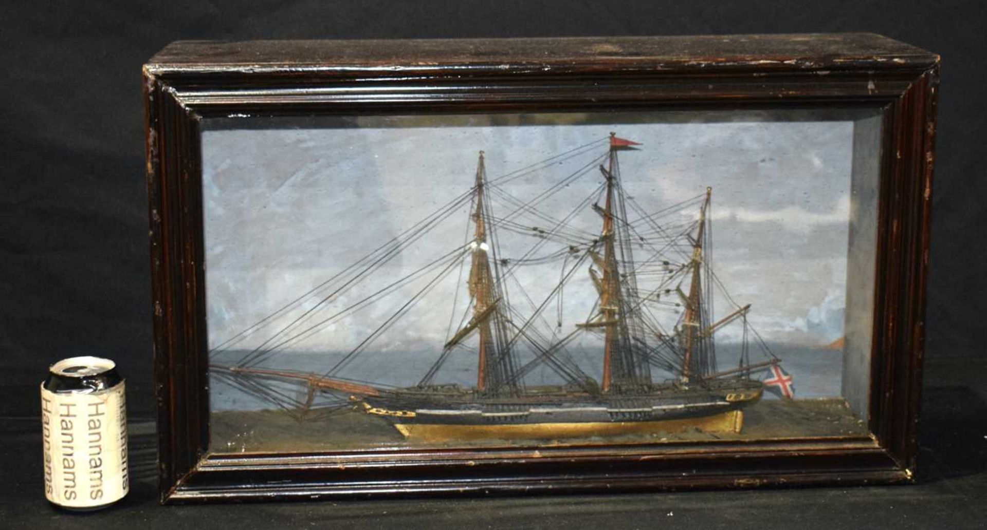 A cased model of a 19th Century sailing boat 36 x 63 x 20 cm