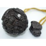 A Japanese Hardwood Ball Inro carved with Insects. 6cm diameter