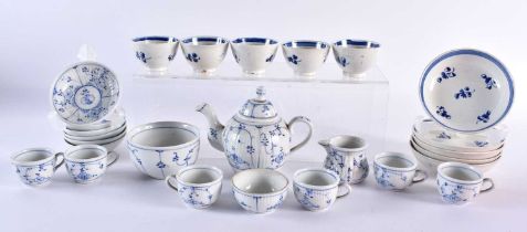 Continental miniature child’s tea set, decorated with periwinkle including teapot and cover, milk