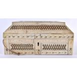 A 19TH CENTURY CONTINENTAL CARVED BONE CASKET decorated all over with filigree motifs. 21 cm x 14