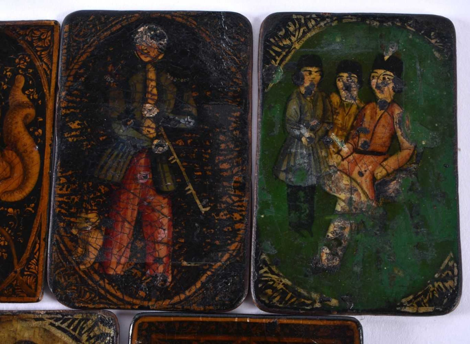 AN UNUSUAL SET OF SEVEN 19TH CENTURY PERSIAN IRANIAN QAJAR LACQUER PAINTINGS depicting figures and - Image 3 of 6
