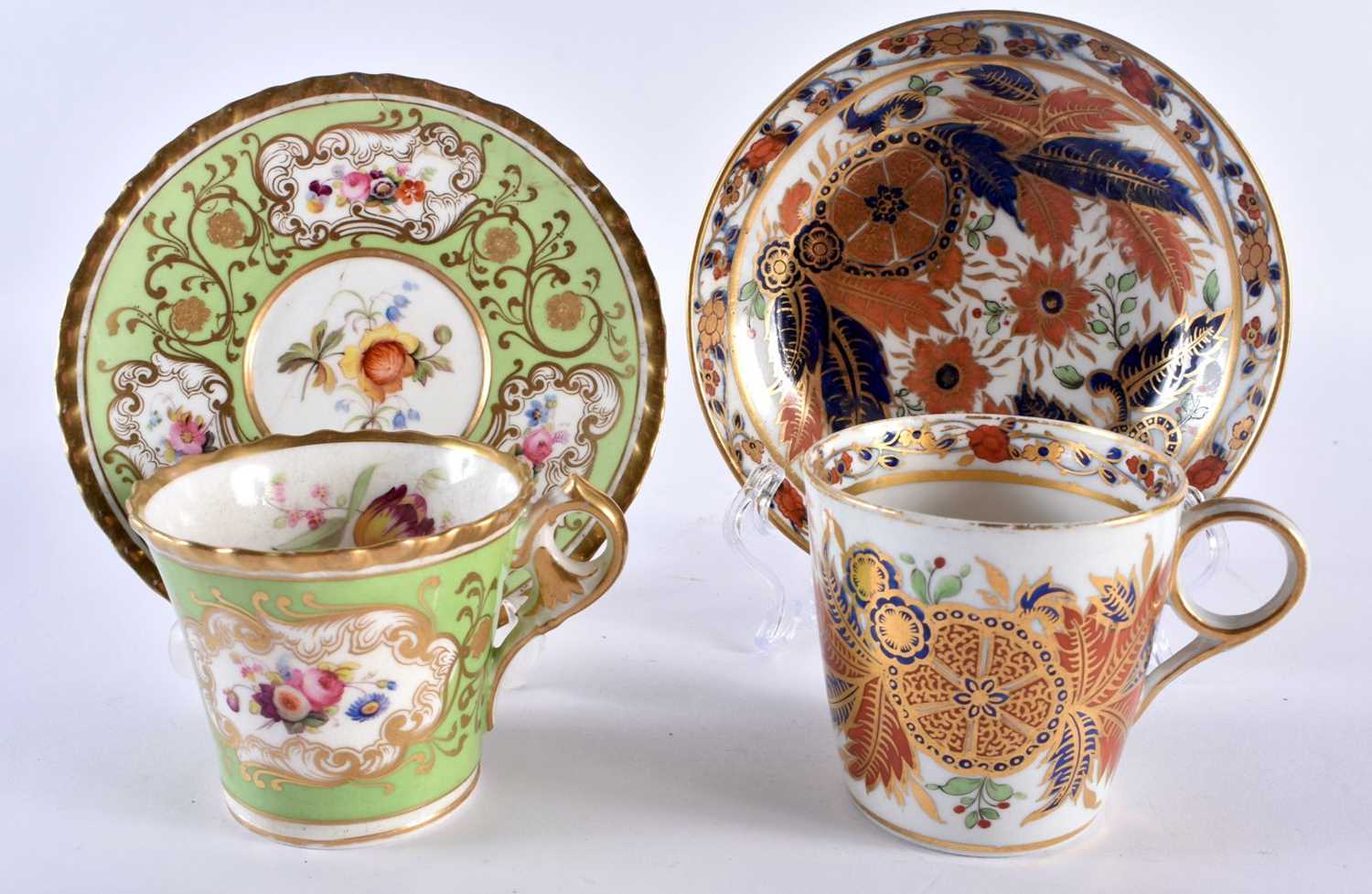 TWO EARLY 19TH CENTURY CHAMBERLAINS WORCESTER CUPS AND SAUCERS one painted with imari foliage, the