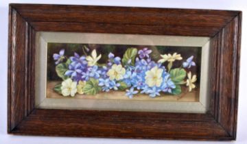 AN ANTIQUE ENGLISH PORCELAIN STILL LIFE FLORAL PLAQUE by M Pritchard. 32 cm x 18 cm.