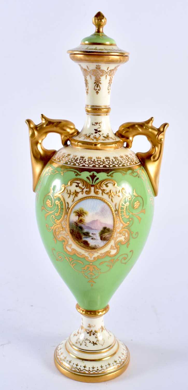 Late 19th early 20th century Coalport apple green vase and cover. 23cm high