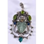 A Silver Gem Set Pendant with a Central carved Hardstone Face. Stamped 925, 7.9cm x 4.8cm, weight