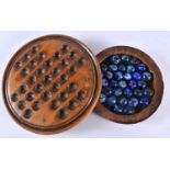 A Victorian Wood Solitaire Board with a Tray containing Marbles. 10.5cm diameter