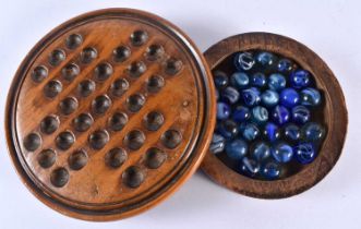 A Victorian Wood Solitaire Board with a Tray containing Marbles. 10.5cm diameter