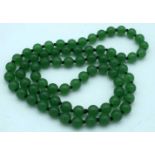A Green Jade Bead Necklace. 68cm long, Bead Size 8mm, weight 56g