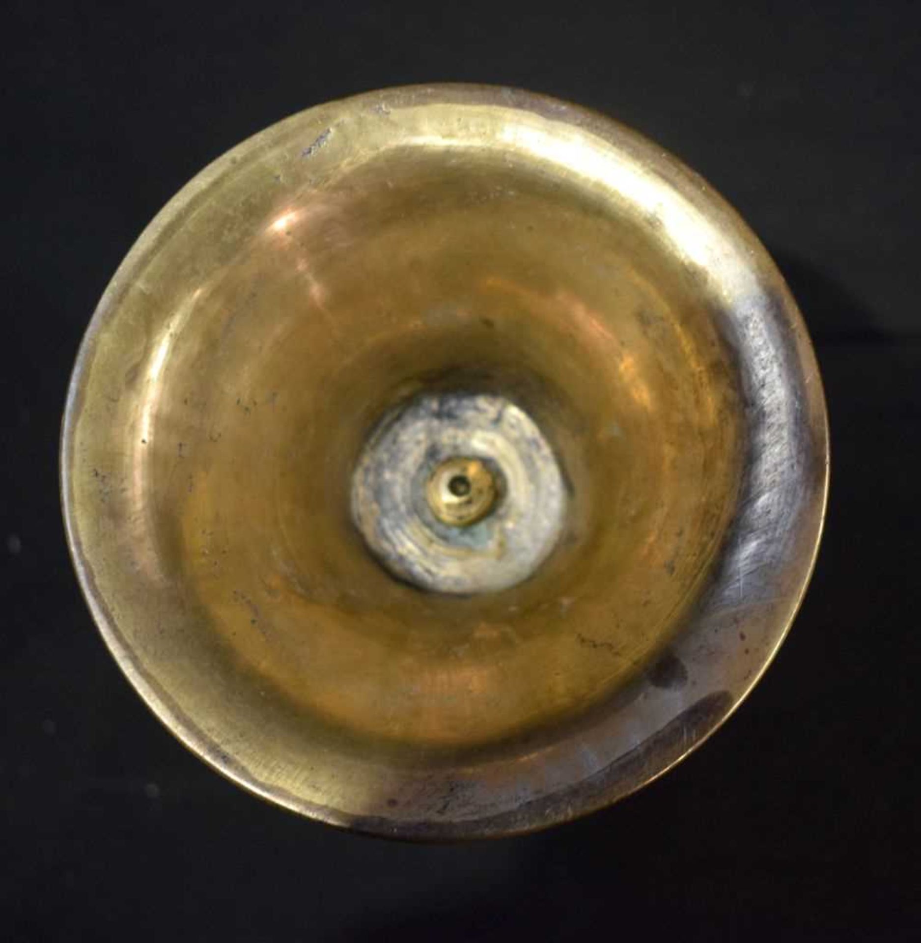 An Islamic brass candle stick holder 20 cm . - Image 2 of 2