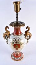 A FINE LARGE 19TH CENTURY EUROPEAN TWIN HANDLED COUNTRY HOUSE PORCELAIN LAMP painted with a solder