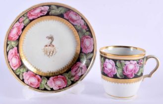 AN EARLY 19TH CENTURY CHAMBERLAINS WORCESTER ARMORIAL CUP AND SAUCER from the Roland Hembrow