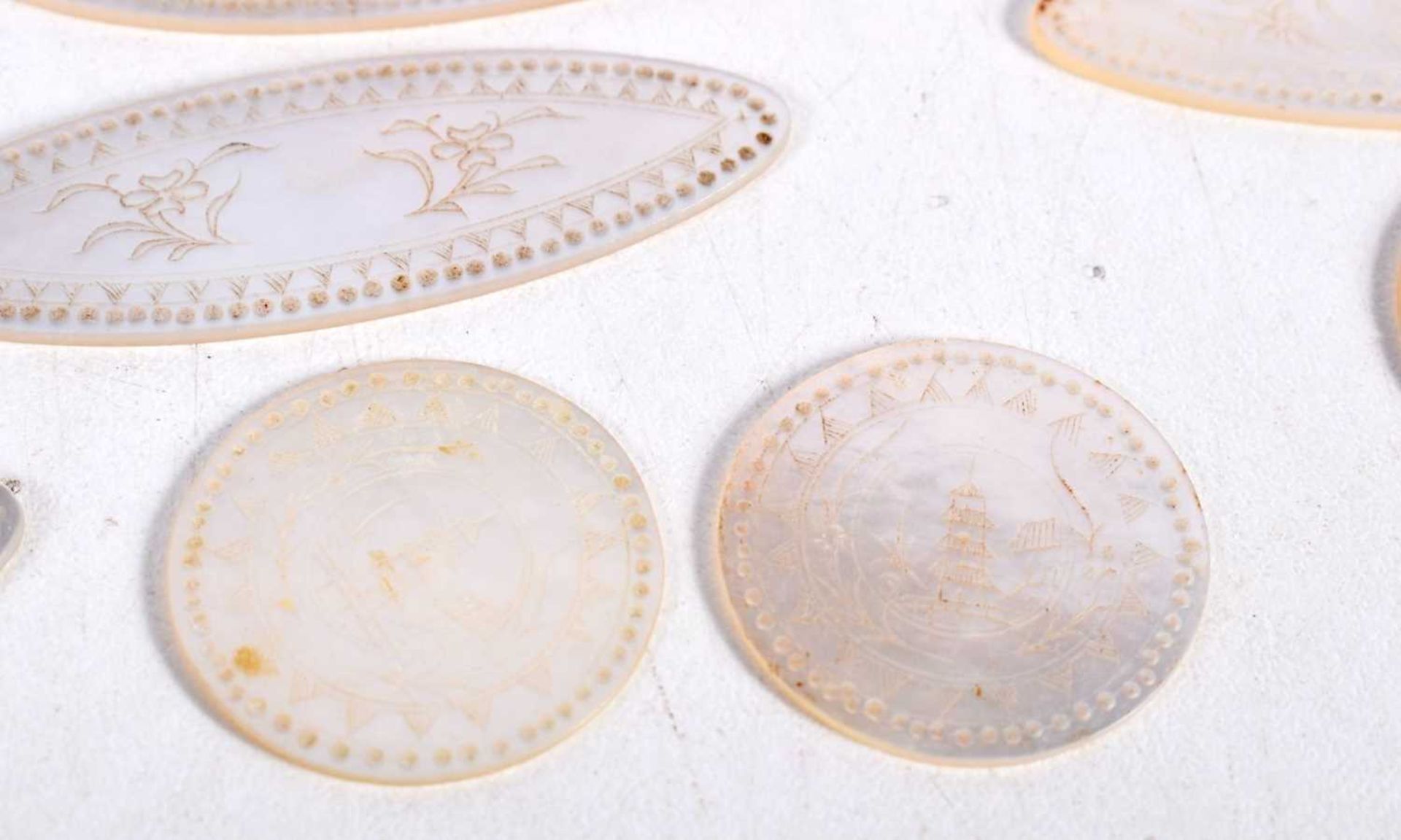 CHINESE MOTHER OF PEARL GAMING COUNTERS. 49.5 grams. Largest 5.25 cm x 1.75 cm. (qty) - Image 2 of 2