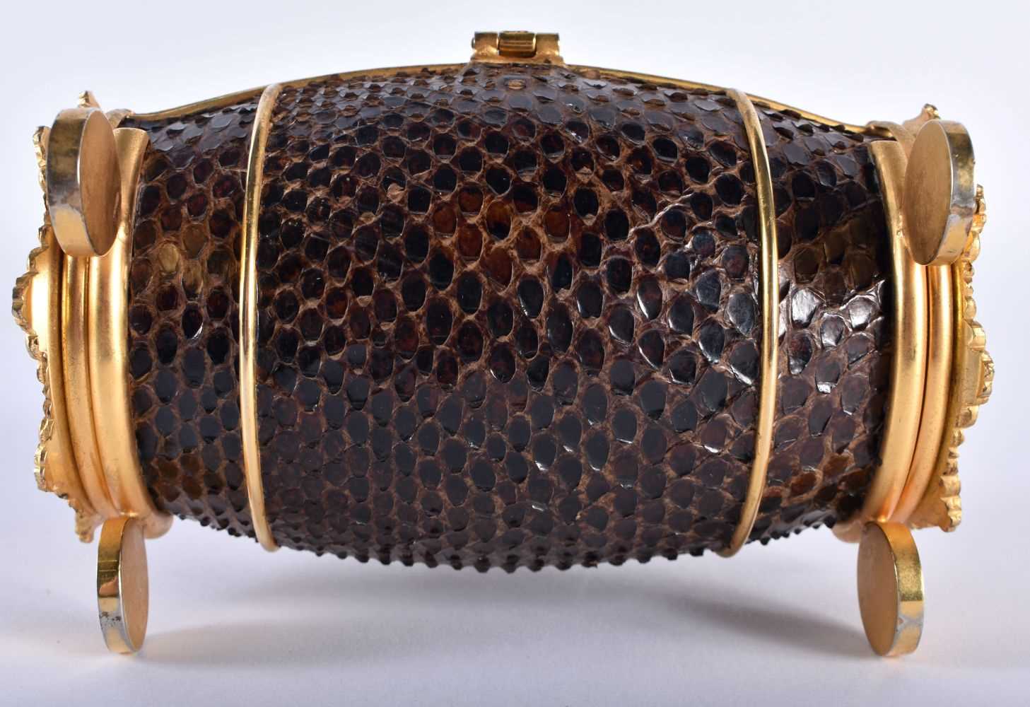 A RARE EARLY 20TH CENTURY FRENCH ORMOLU AND SNAKESKIN BOX of oval drum form, decorated to each end - Image 6 of 6