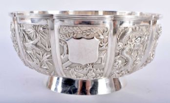 A FINE LARGE 19TH CENTURY CHINESE EXPORT SILVER REPOUSSE DRAGON BOWL signed WA (unidentified maker