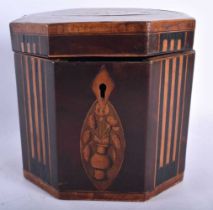 AN UNUSUAL GEORGE III MAHOGANY HEXAGONAL TEA CADDY with walnut banding, the top decorated with a