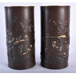 A FINE PAIR OF 19TH CENTURY JAPANESE MEIJI PERIOD BRONZE VASES by Inoue, decorated in relief with