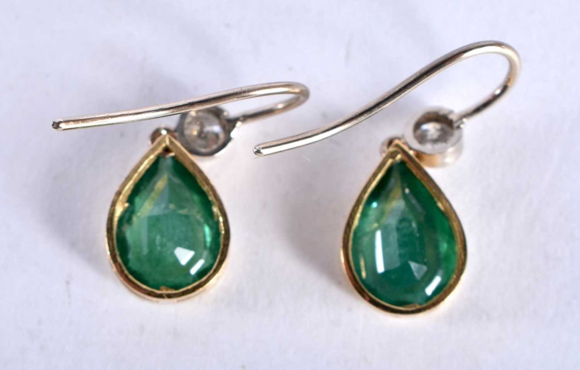 A PAIR OF 18CT GOLD DIAMOND AND EMERALD EARRINGS each emerald 10 mm x 8 mm and approx 1.25 cts each. - Image 2 of 8