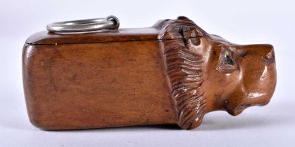 AN UNUSUAL 19TH CENTURY CONTINENTAL CARVED FRUITWOOD SNUFF BOX formed as a lion with glass eyes. 9