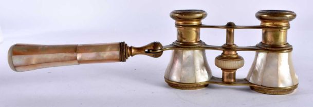 A PAIR OF MOTHER OF PEARL INLAID OPERA GLASSES with telescopic arm. Glasses - 10cm x 5.6cm extended.