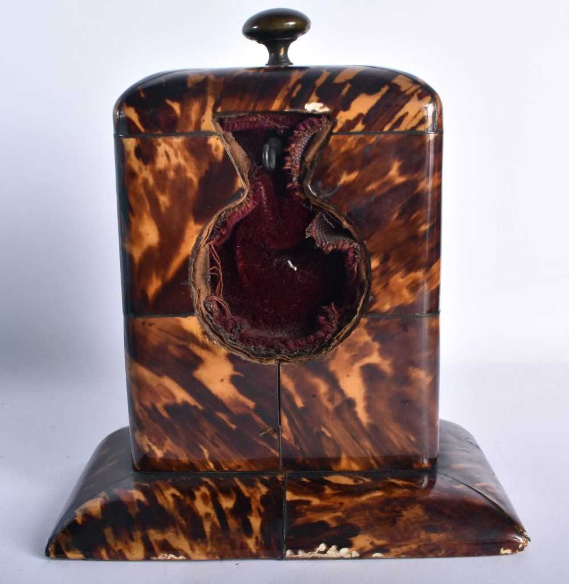 AN UNUSUAL REGENCY CARVED TORTOISESHELL POCKET WATCH HOLDER with large bronze finial, the central