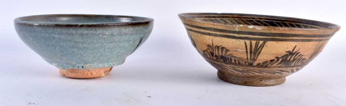 TWO EARLY CHINESE BOWLS probably song to yuan. Largest 7.5 cm x 18.5 cm. (2)