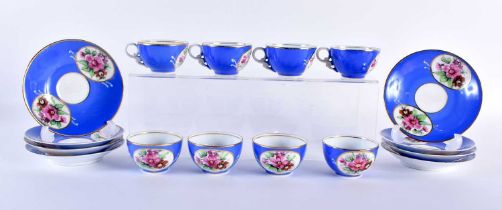 A SET OF EIGHT 19TH CENTURY RUSSIAN KUZNETSOV PORCELAIN CUPS AND SAUCERS painted with floral