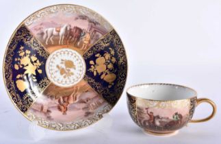 A LATE 19TH CENTURY MEISSEN PORCELAIN TEACUP AND SAUCER painted with figures on horseback within a