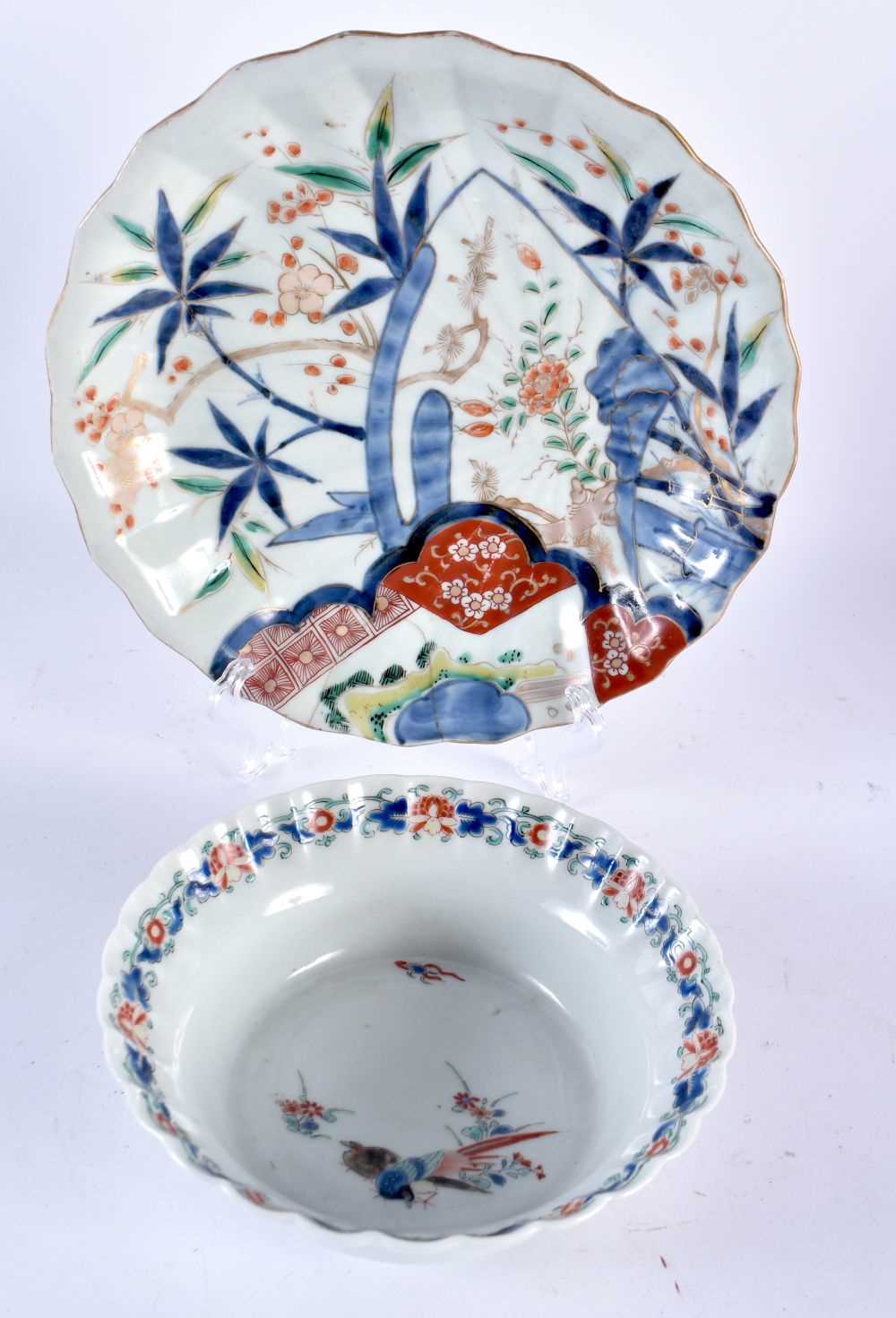 AN 18TH CENTURY JAPANESE EDO PERIOD BOWL together with a similar dish. 22.5 cm diameter. (2)