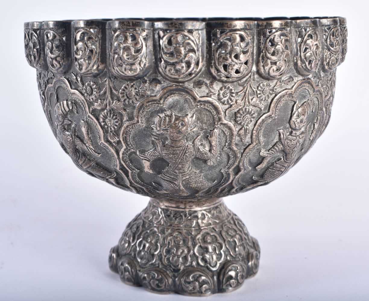 AN ANTIQUE MIDDLE EASTERN ASIAN SILVER REPOUSSE BOWL. 355 grams. 16 cm x 13.5 cm.