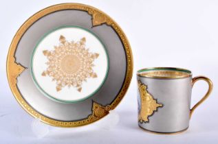 AN UNUSUAL LATE 19TH CENTURY FRENCH SEVRES PORCELAIN TEACUP AND SAUCER painted with putti on an