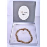 A gold tone necklace by Christian Dior (55g)