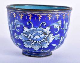 AN 18TH/19TH CENTURY CHINESE CANTON ENAMEL TEABOWL Qianlong/Jiaqing, painted with flowers. 5 cm x
