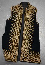 A 19TH CENTURY MIDDLE EASTERN TURKISH OTTOMAN SILK JACKET. 46 cm wide (armpit to armpit).