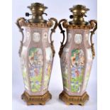A LARGE PAIR OF 18TH CENTURY CHINESE EXPORT TWIN HANDLED COUNTRY HOUSE PORCELAIN OIL LAMPS Qianlong,