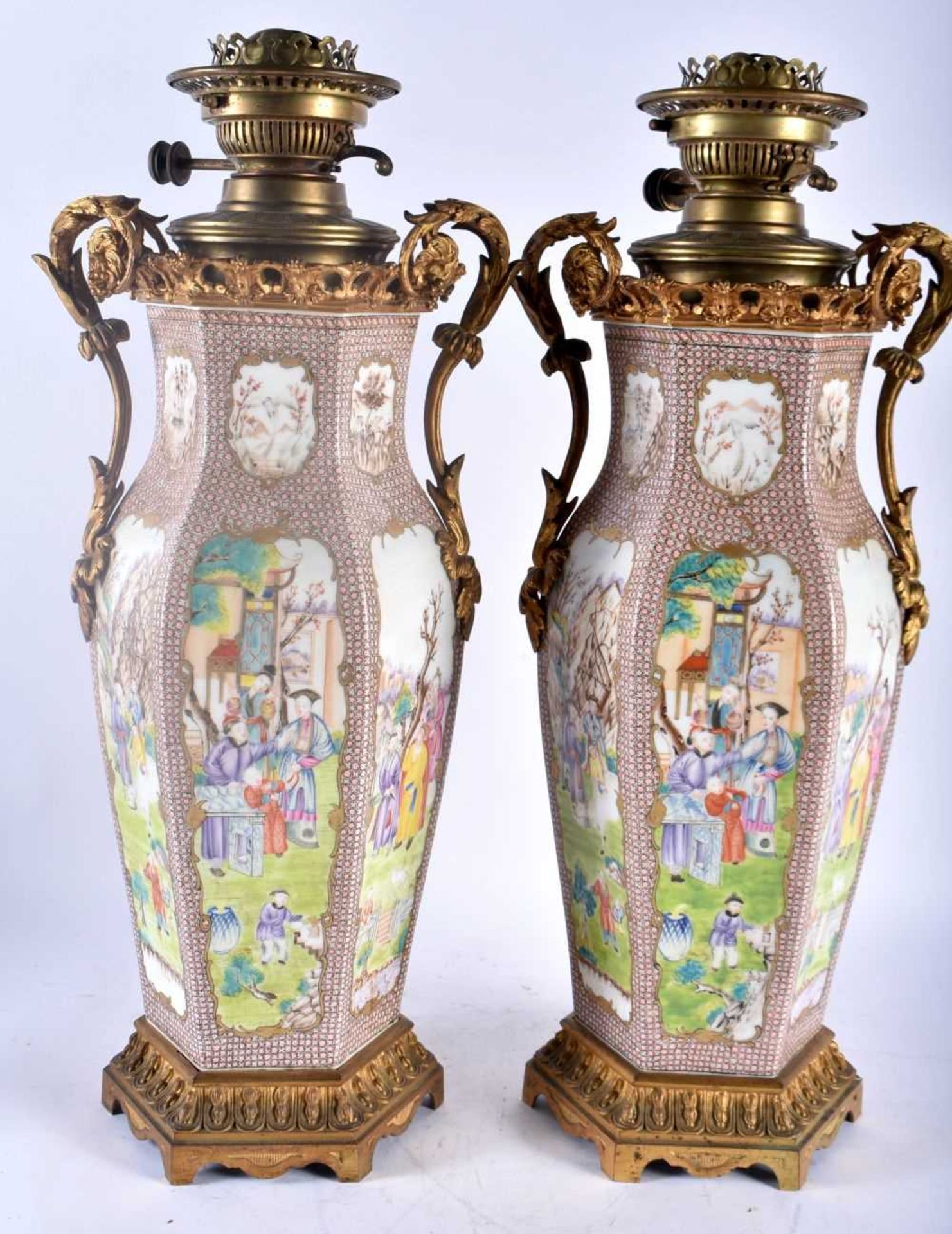 A LARGE PAIR OF 18TH CENTURY CHINESE EXPORT TWIN HANDLED COUNTRY HOUSE PORCELAIN OIL LAMPS Qianlong,