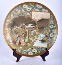 A 19TH CENTURY JAPANESE MEIJI PERIOD SATSUMA POTTERY DISH by Kinkozan, painted with figures within a