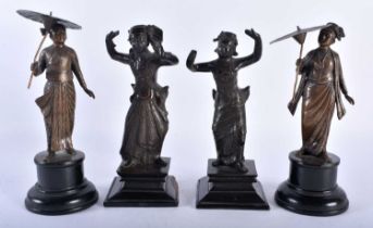 A GROUP OF FOUR 19TH CENTURY SOUTHEAST ASIAN BRONZE FIGURES one modelled as a pair holding parasols,