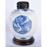 A 17TH CENTURY CHINESE BLUE AND WHITE PORCELAIN GINGER JAR AND COVER Kangxi, painted with stylised