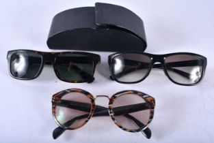 Three Pairs of Prada Sunglasses (3)