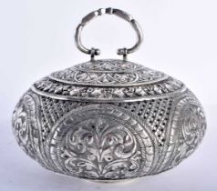 A LATE 19TH CENTURY INDIAN SILVER CIRCULAR TRAVELLING INCENSE BURNER AND COVER decorated with