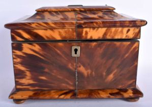 A FINE REGENCY CARVED TORTOISESHELL TEA CADDY of rectangular form, with vacant cartouche, wire