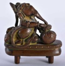 A 19TH CENTURY INDIAN BRONZE FIGURE OF GANESH modelled upon a stand. 560 grams. 9 cm x 9 cm.