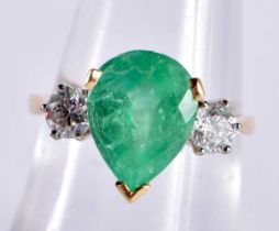 A FINE 18CT GOLD DIAMOND AND EMERALD RING the emerald 11 mm x 8.5 mm approx 1.75 cts. N. 3.6 grams.